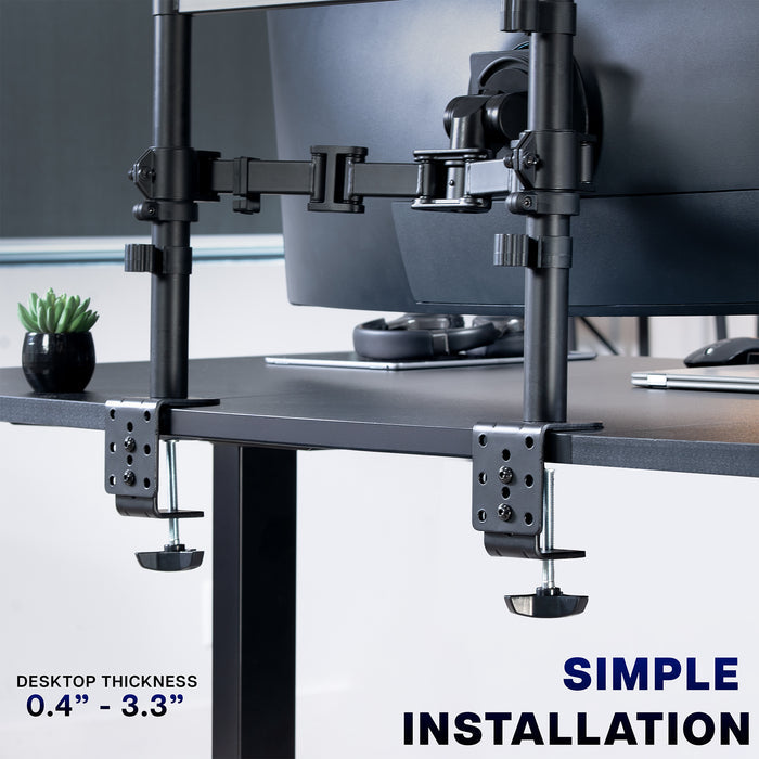 Monitor stand with "C" clamps on a desk, featuring text about desktop thickness and installation.