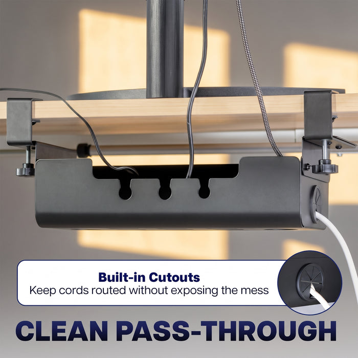 Under-desk cable management box with pass-through openings for neatly routing power and charging cables.