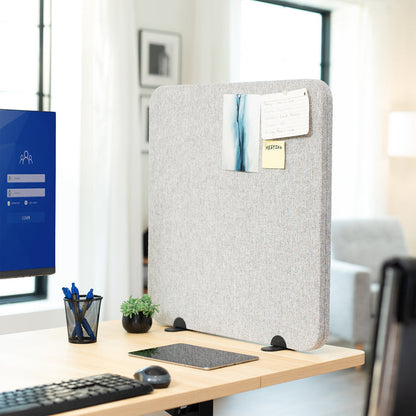 Desk Privacy Panel on a wooden desk with a computer monitor, keyboard, and office supplies.
