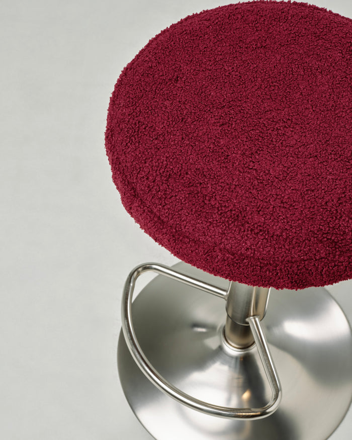 t4option0_2 | Close-up of the Gigi bar stool with a Burgundy upholstered cushion, stainless steel base.