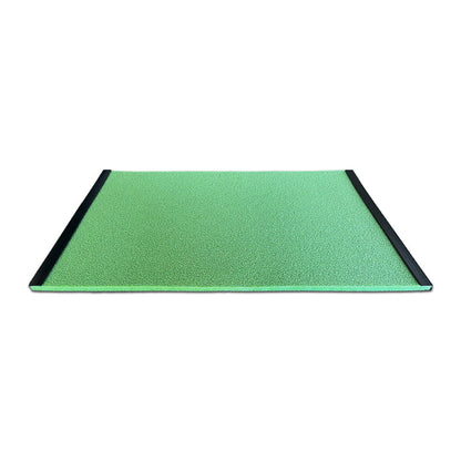 The BirdieBall Golf Stance Mat (Options Available) is a rectangular green mat with black edging on two sides, made with durable RollTech foam and shown on a white background.