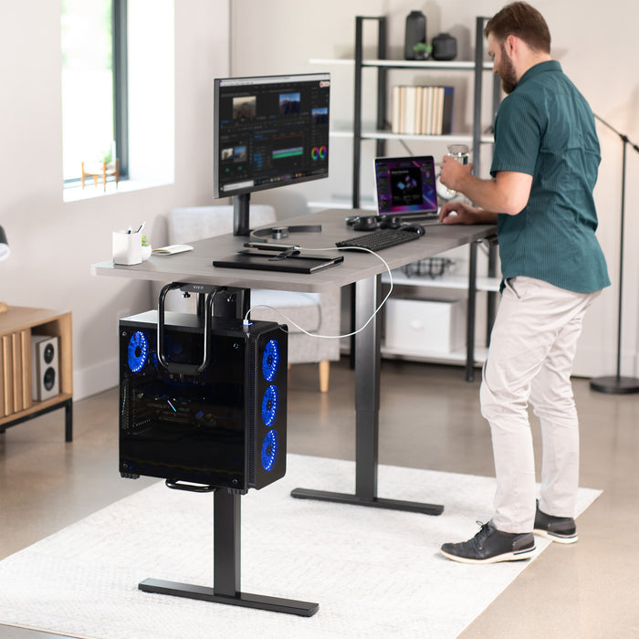 Sturdy under desk PC mount with adjustable width and height and protective padding included.