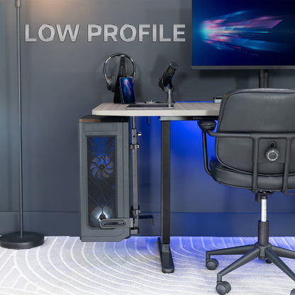 Gaming setup with a low-profile computer case, PC Under-Desk Mount, desk, chair, and monitor.