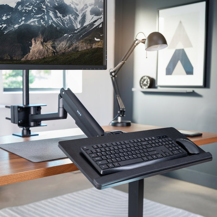 Pneumatic Pole Mounted Keyboard Tray attached to monitor pole mount