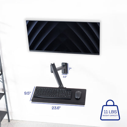 A wall mounted keyboard tray with a pneumatic mechanism with measurement text.