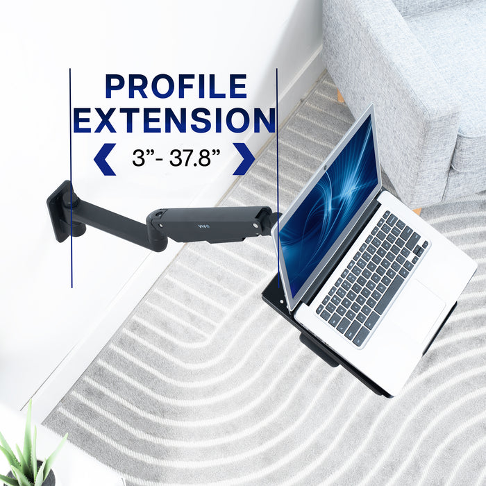 Pneumatic Wall Mounted Laptop Tray that extends from wall.