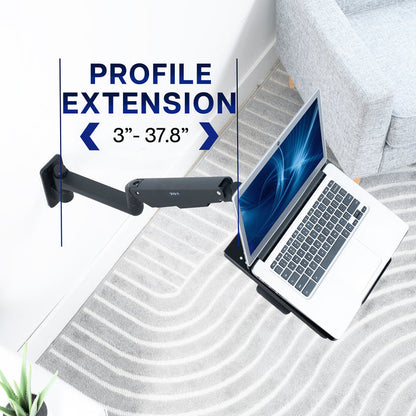 Pneumatic Wall Mounted Laptop Tray that extends from wall.