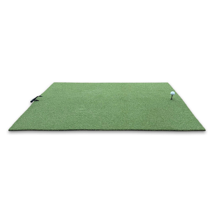 The BirdieBall Premium Turf Golf Hitting Mat is a rectangular green mat with artificial turf, featuring a black tee holding a white golf ball on the right and a black handle attached to the left edge.