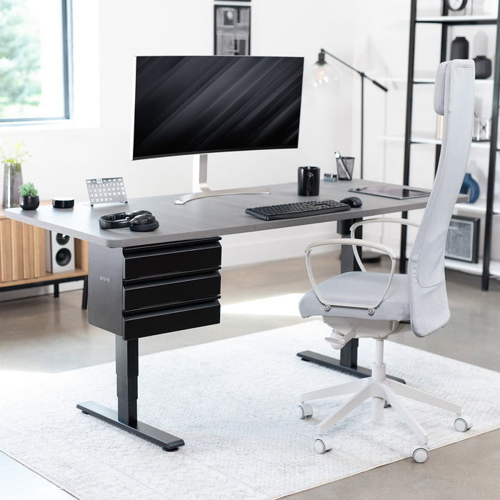 Sleek under desk storage unit with three pull-out drawers for office workstation organization.