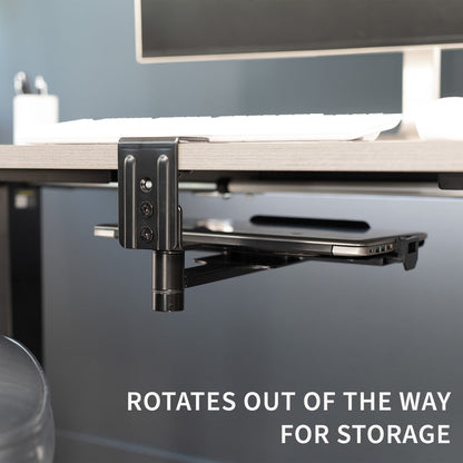 Rotates out of the way and can be used for storage