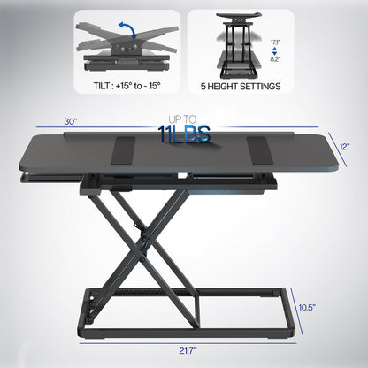 A black tilting keyboard riser with a mouse on top and the ability to adjust the angle of the keyboard surface with measurement icons.